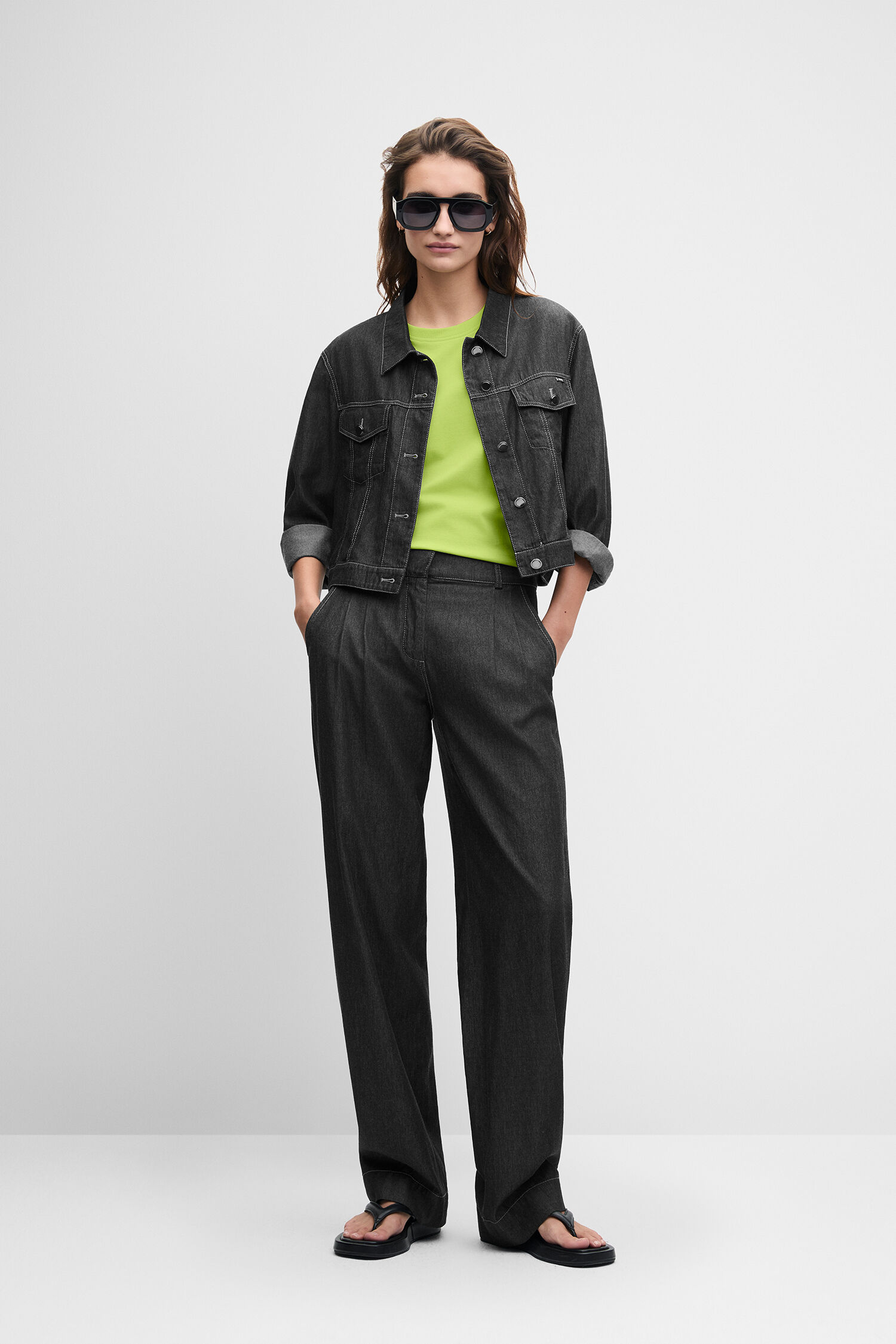 Denim jacket,  Denim pants,  Wide legs,  Lime green top,  Sunglasses