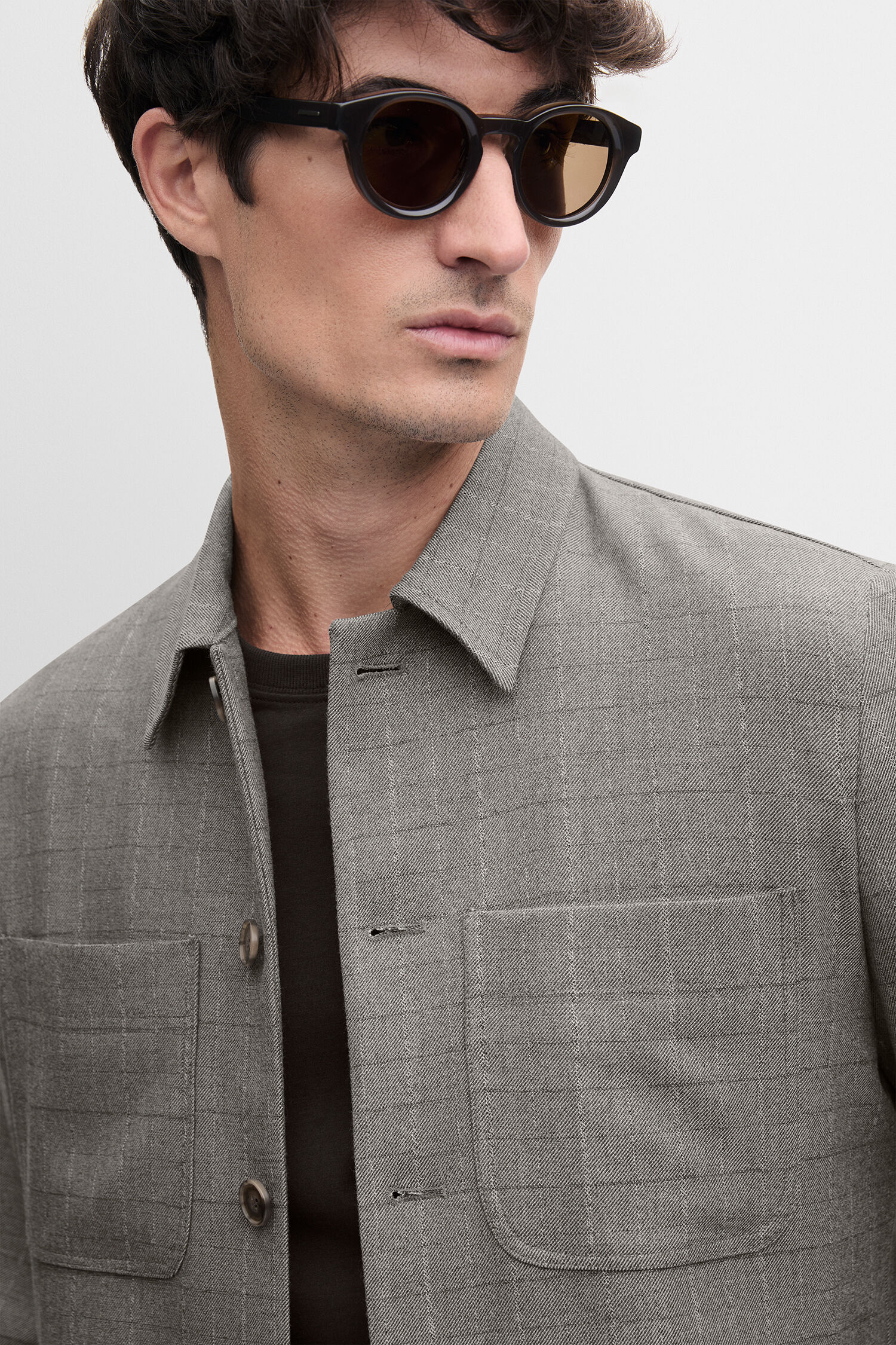 Sunglasses, Gray jacket, Patterned jacket, Front pockets, Button placket