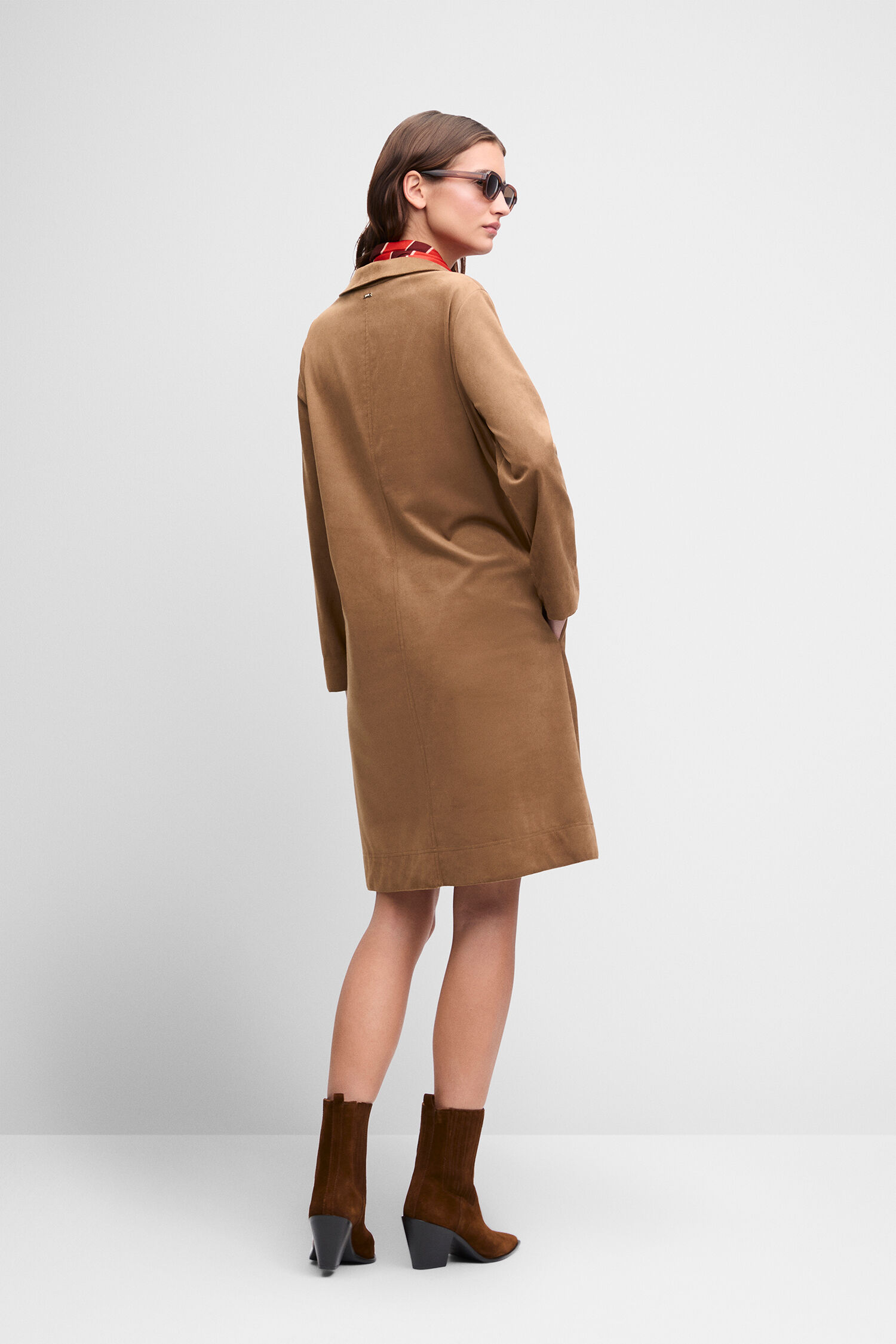 camel coat, knee-length, long sleeves, boots, sunglasses