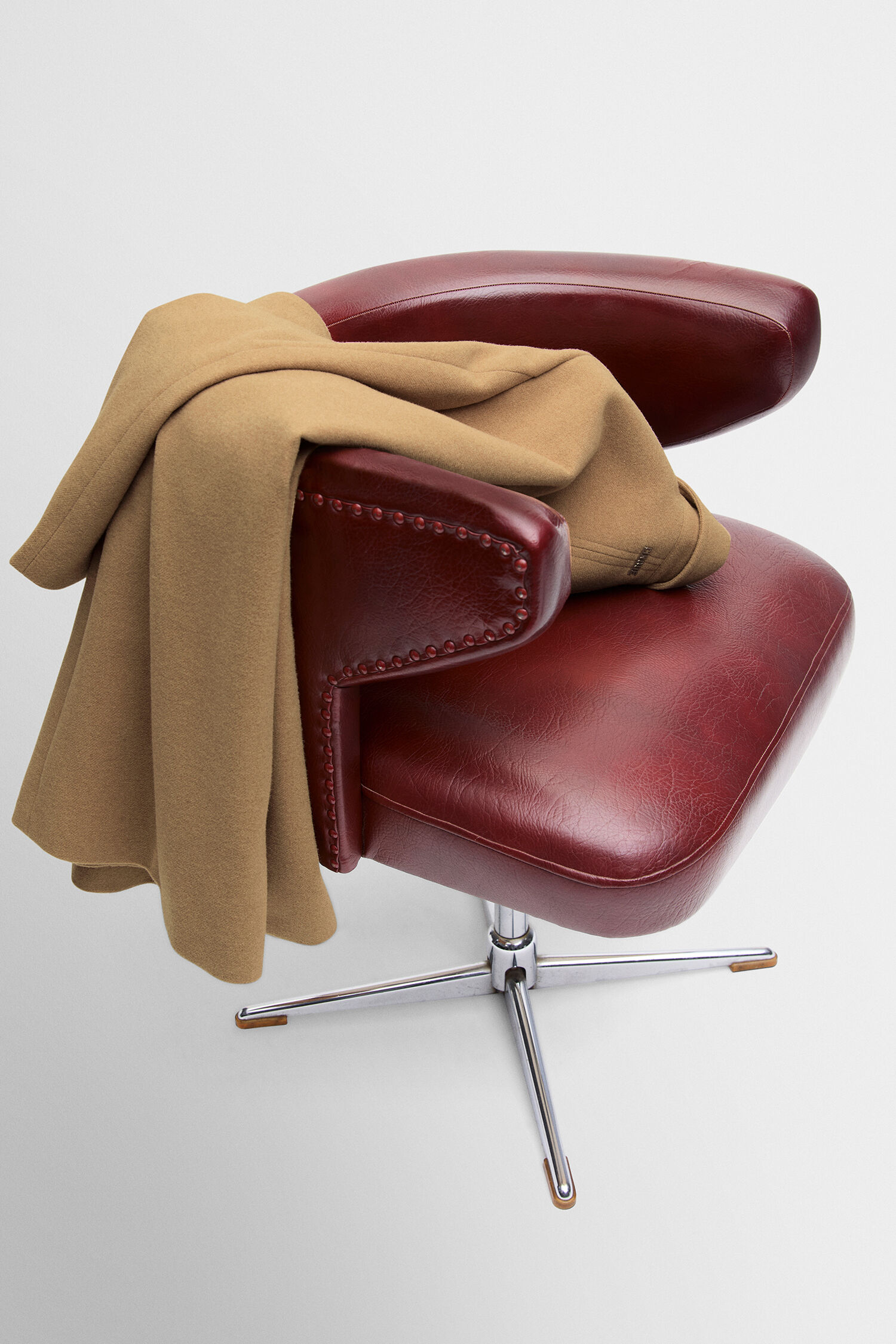 lounge chair, red leather, armchair, swivel chair, blanket