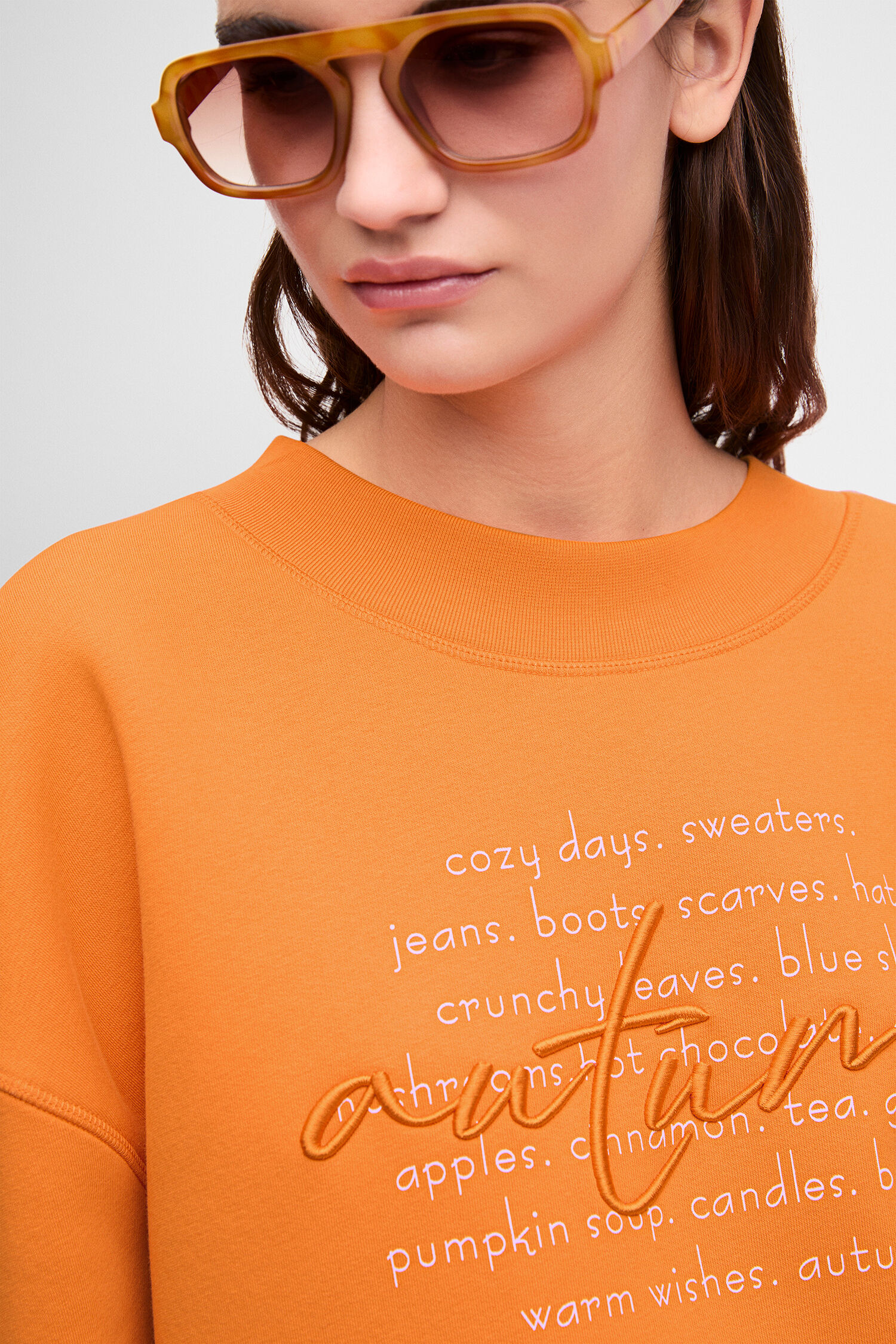 sweatshirt, orange, oversized, text print, glasses not included