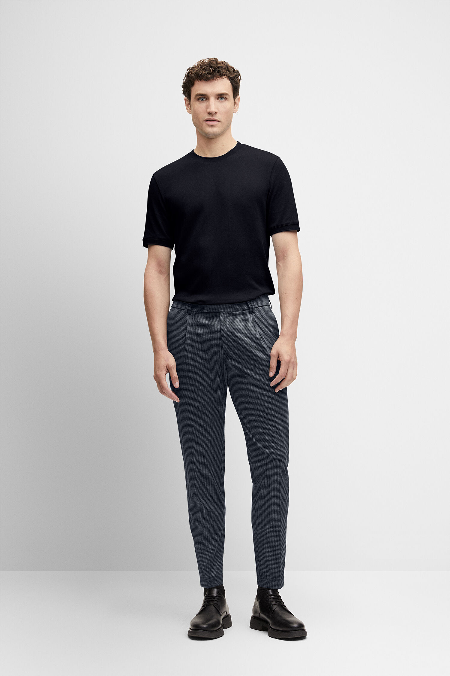 Black t shirt with grey pants on sale