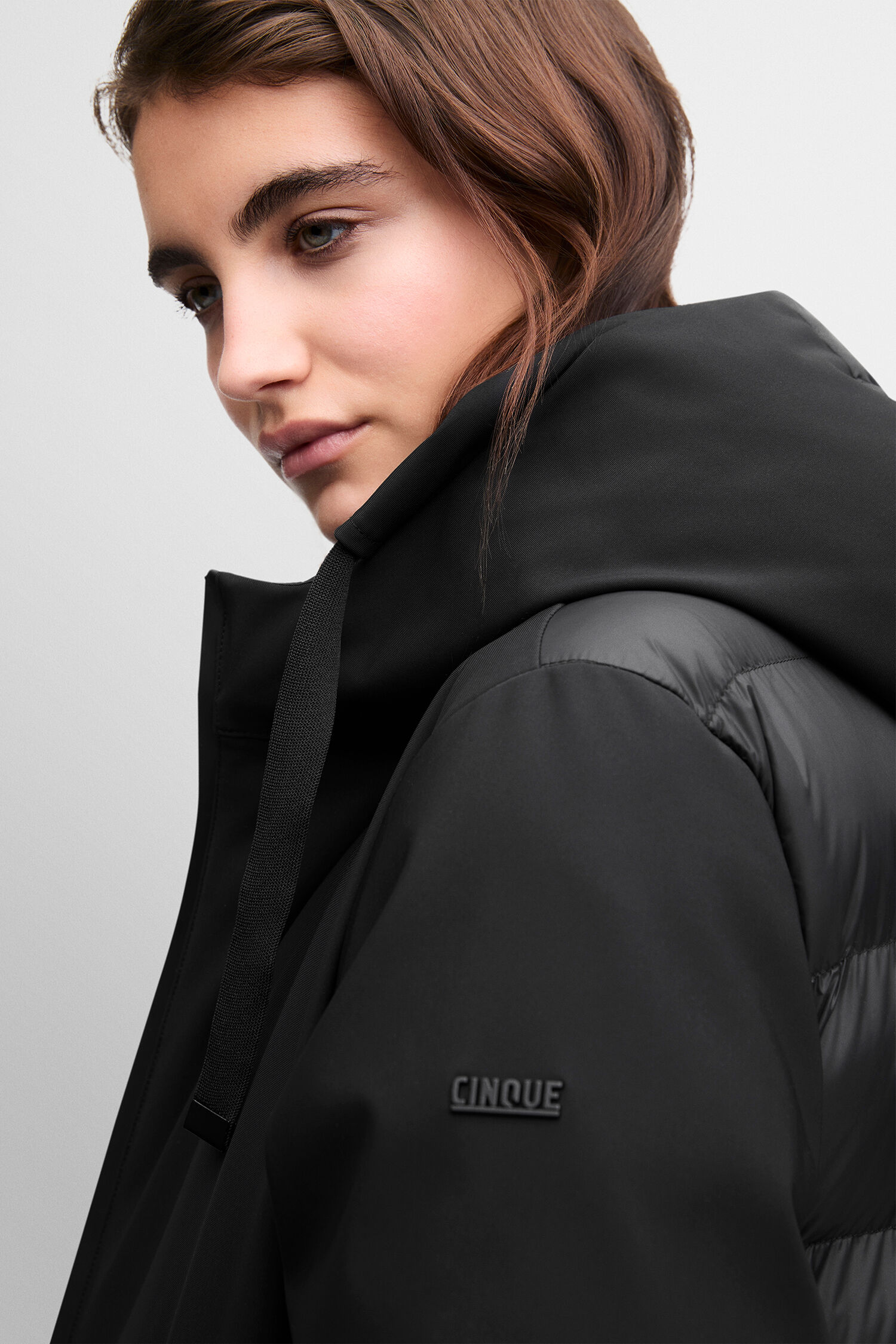 black jacket, puffer sleeve, hooded coat, Cinque logo, collar hood