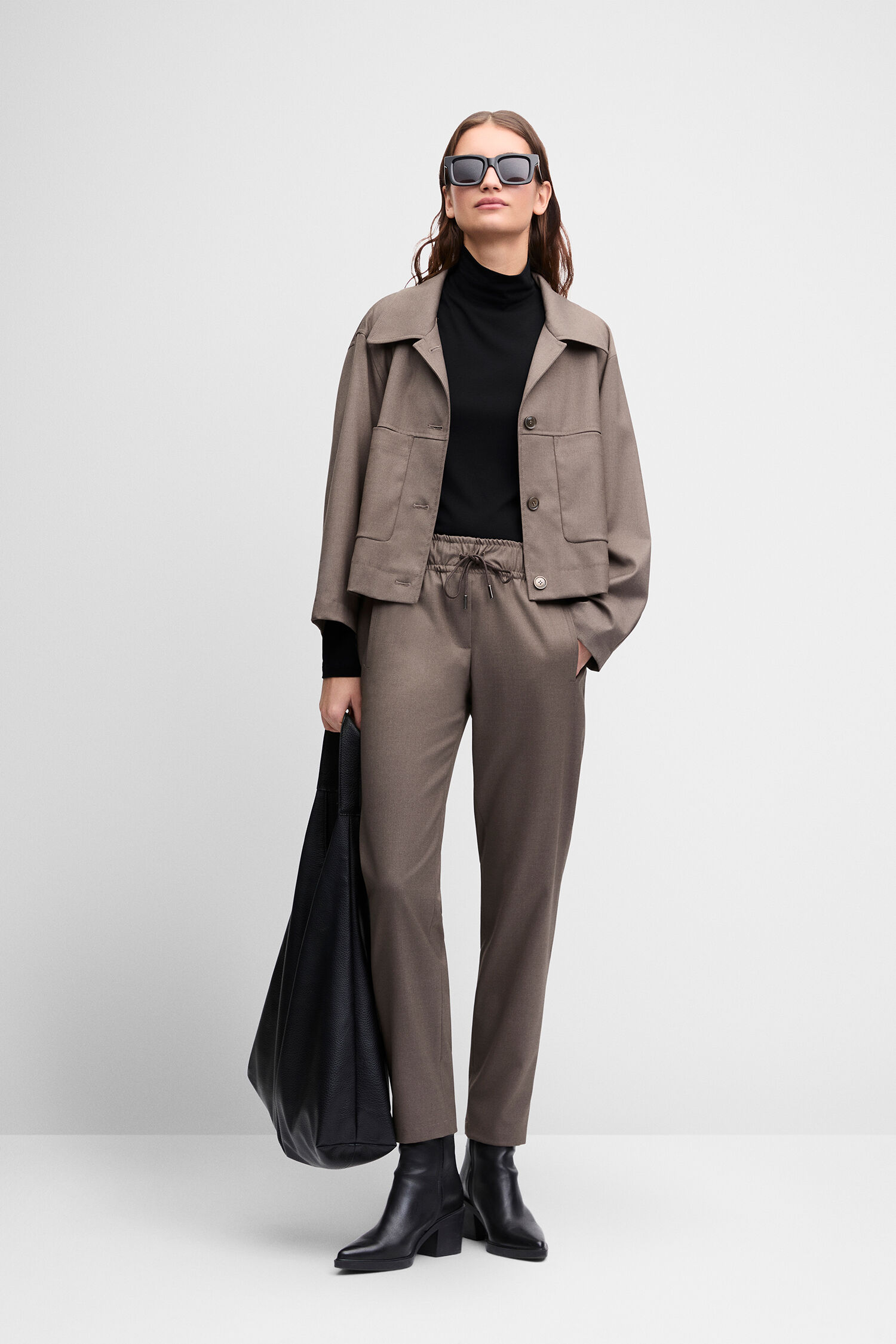 taupe blazer, oversized jacket, turtleneck, drawstring pants, black boots