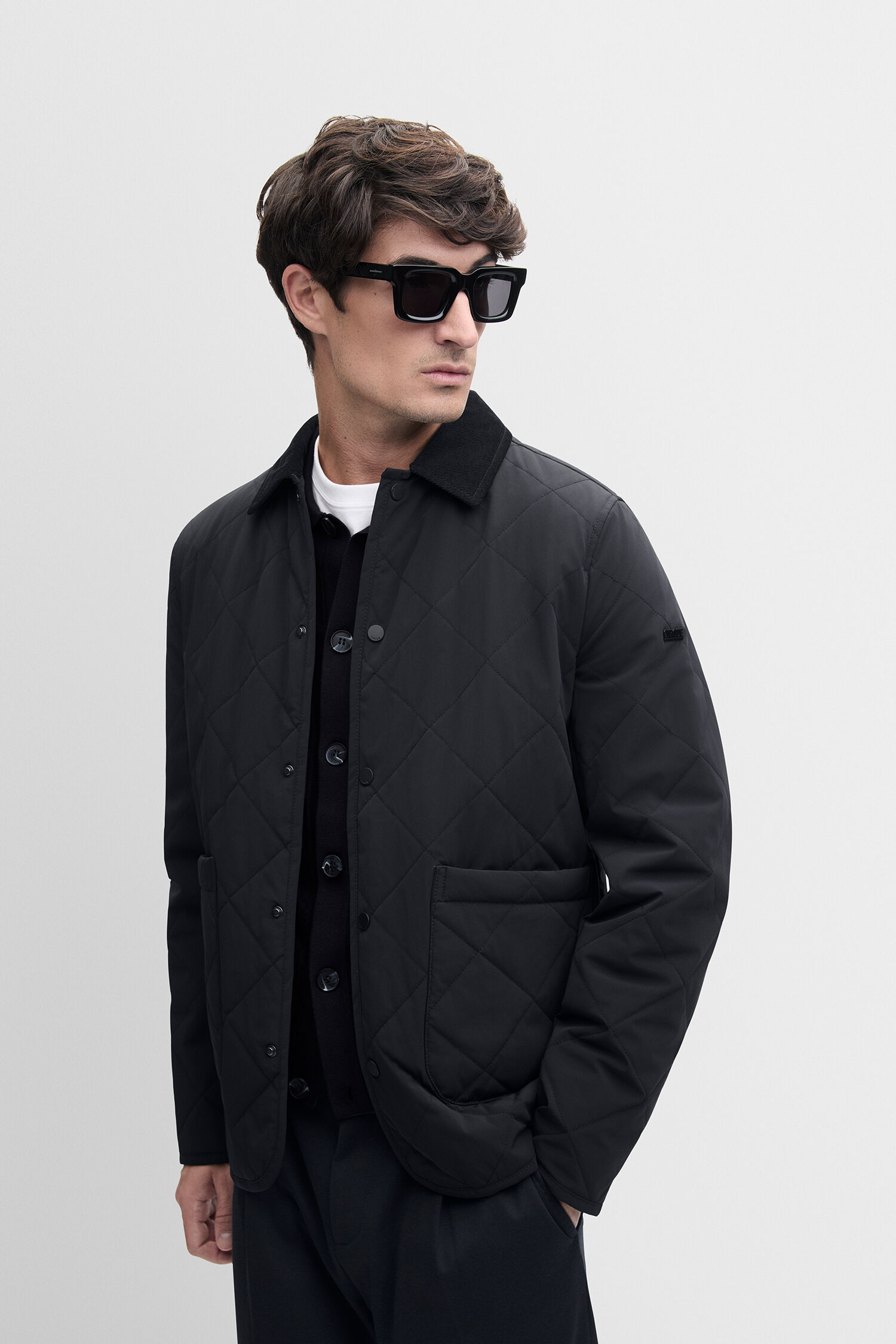 Quilted jacket, Black jacket, Layered look, Long sleeves, Front pockets